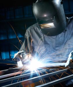 man welding